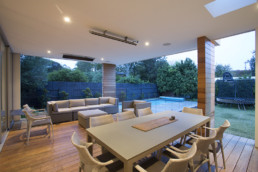 Outdoor living area of Contemporary style home built in Beaumaris by TrademarkBuilders